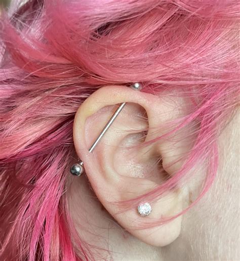 industrial piercing with chain|correct anatomy for industrial piercing.